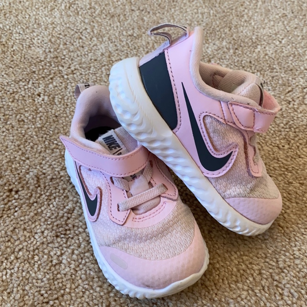 Baby pink Nike Revolution sneakers